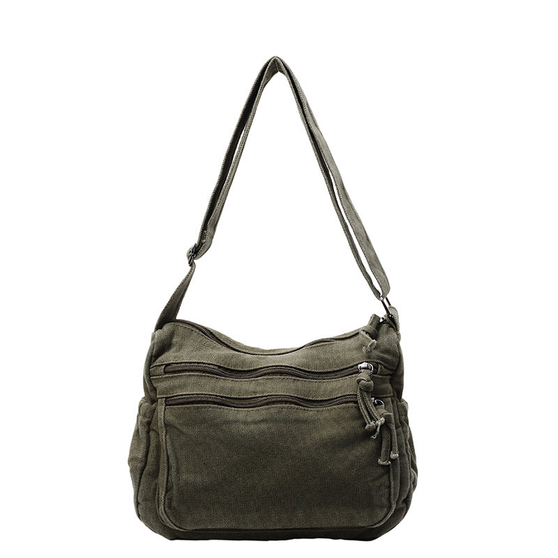 Canvasväska med flera fickor 🎒 Lätt och slitstark, justerbar axelrem, kan bäras som axelväska eller crossbody-väska 👜
