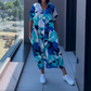👗50% RABATT! 🌸 Elegant V-halsad Klänning med Tryck för Kvinnor – Flytande Tyg, Smickrande Passform & Perfekt för Våren ☀️