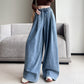 Högmidjade jeans med vida ben