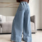 Högmidjade jeans med vida ben