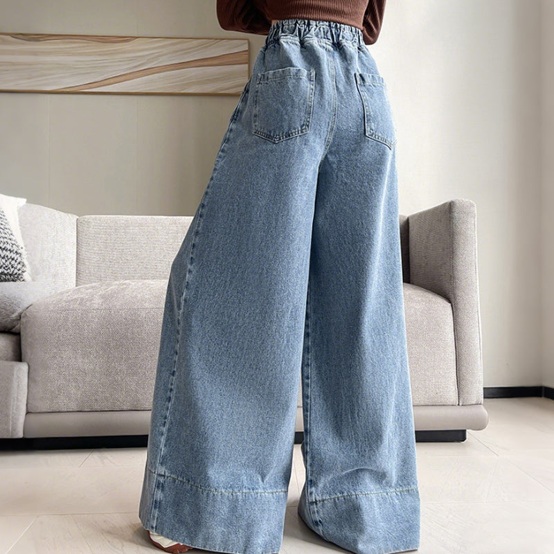Högmidjade jeans med vida ben