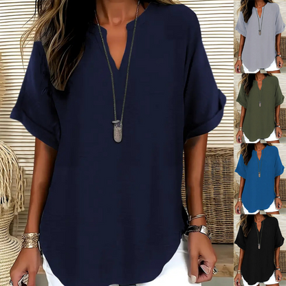 👚60% RABATT! 🔥Modern, lös kortärmad topp – V-ringning med skåra, asymmetrisk fåll och lätt tyg (5 färger, S–2XL) 🌸