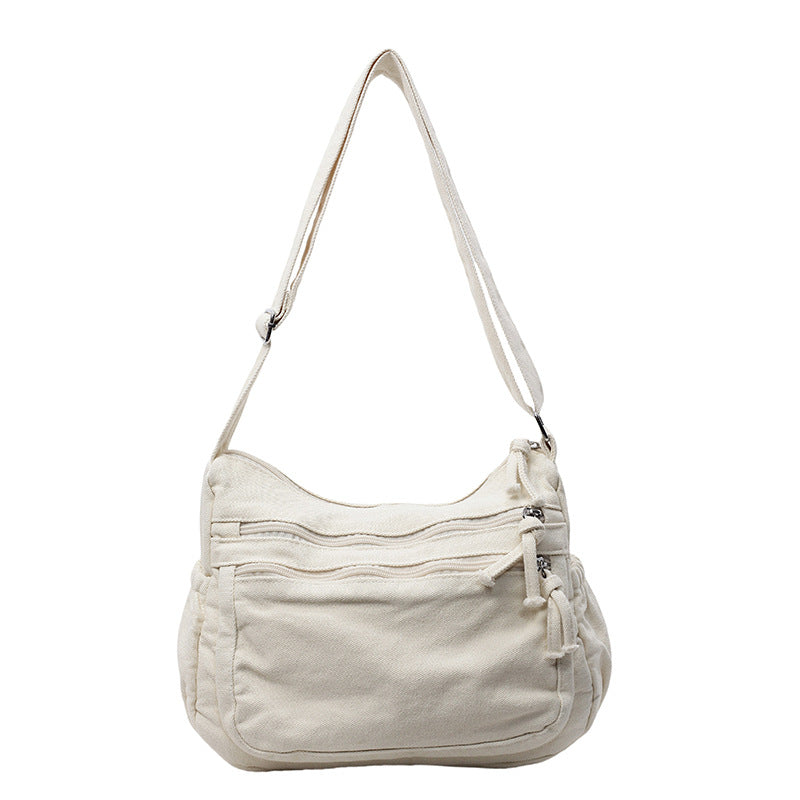Canvasväska med flera fickor 🎒 Lätt och slitstark, justerbar axelrem, kan bäras som axelväska eller crossbody-väska 👜
