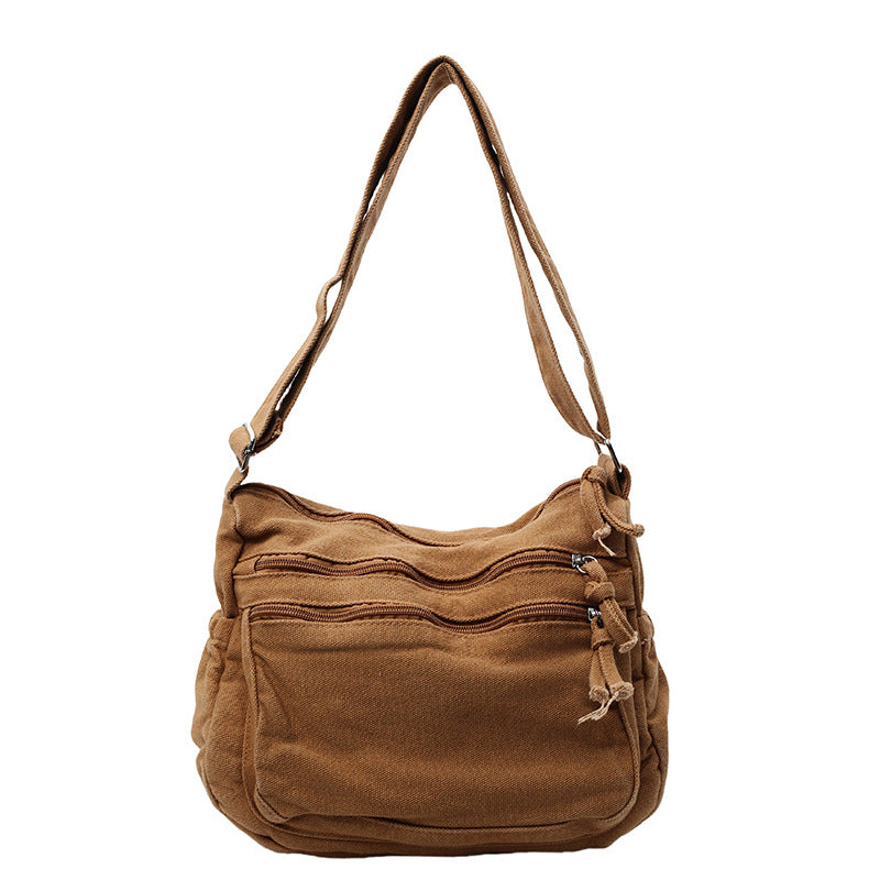 Canvasväska med flera fickor 🎒 Lätt och slitstark, justerbar axelrem, kan bäras som axelväska eller crossbody-väska 👜