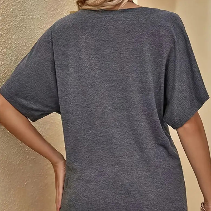 Avslappnad damtopp med kort ärm och off-shoulder