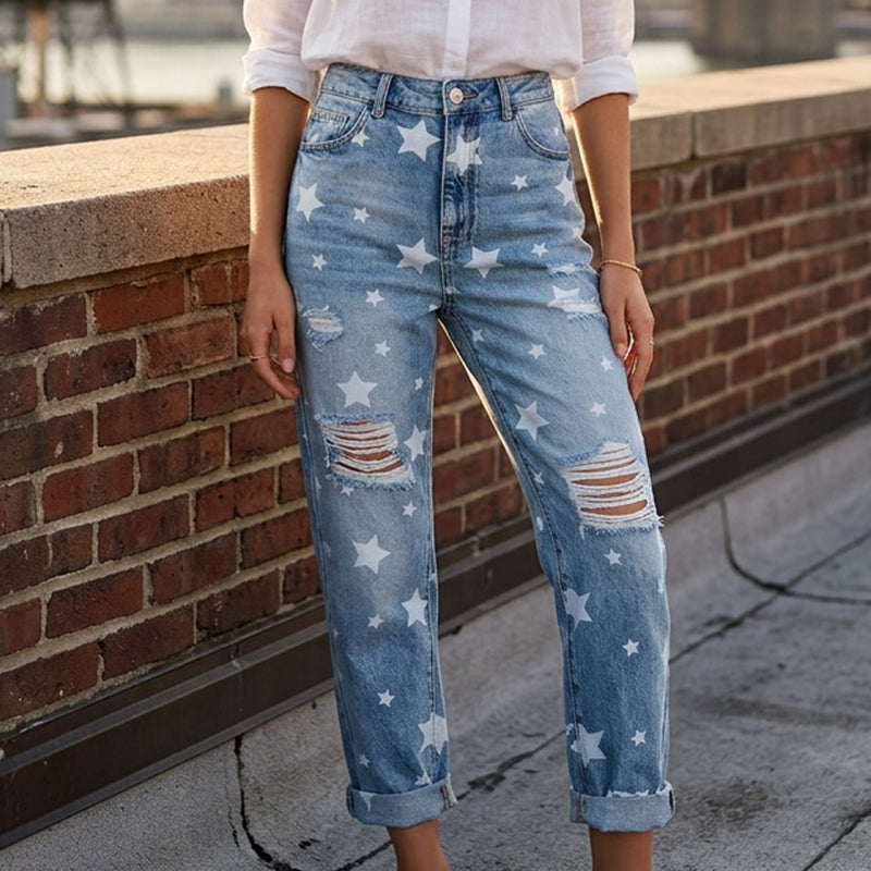 Dammjeans med stjärnmönster, slitna och hög midja