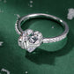 Elegant silverring med hjärtdetalj och rosett