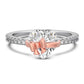 Elegant silverring med hjärtdetalj och rosett